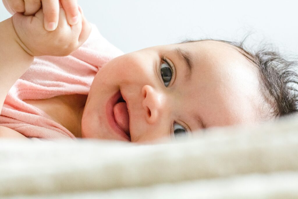 smiling baby depicted in copy about "counterstrain success stories"